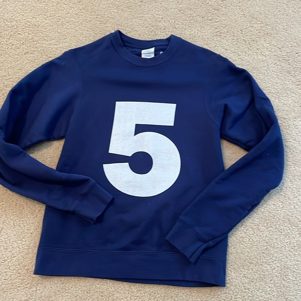 Navy number 5 crew sweatshirt.